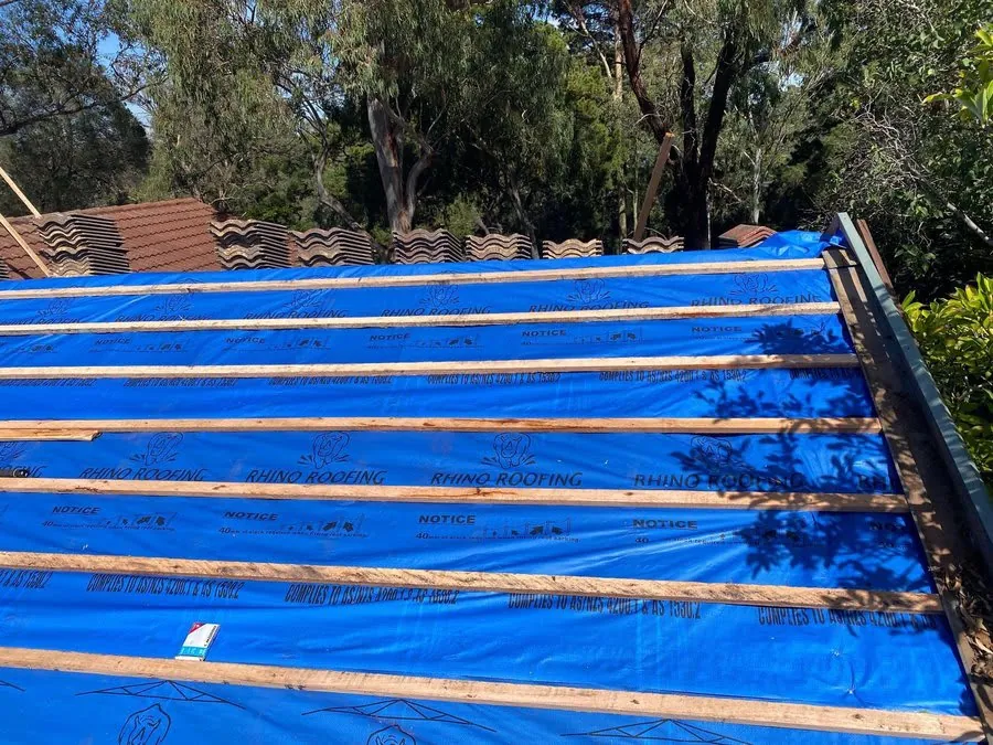 Old, damaged and broken roof tiles that may need replacement