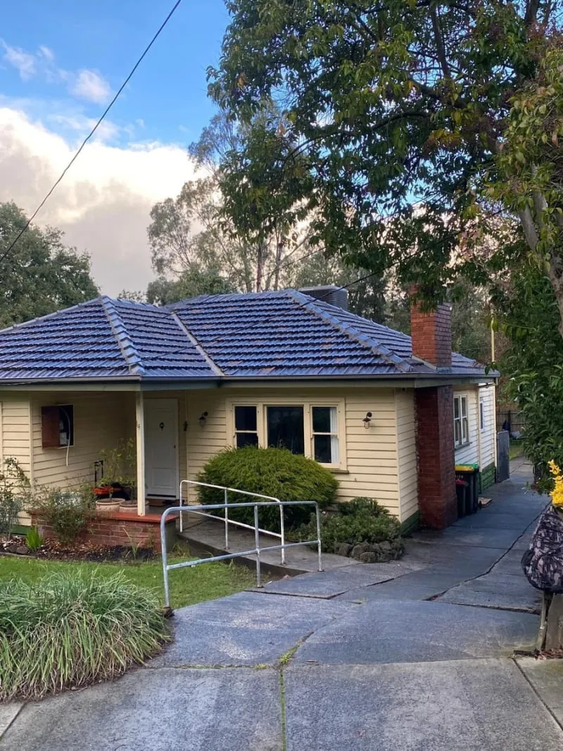 Well-maintained Melbourne home with a tiled roof and painted exterior